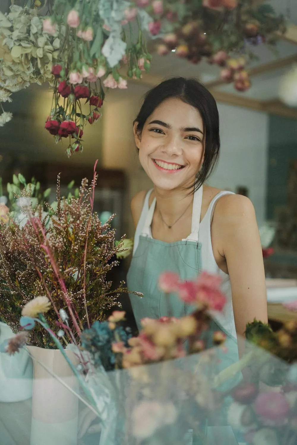smiling flower shop employee